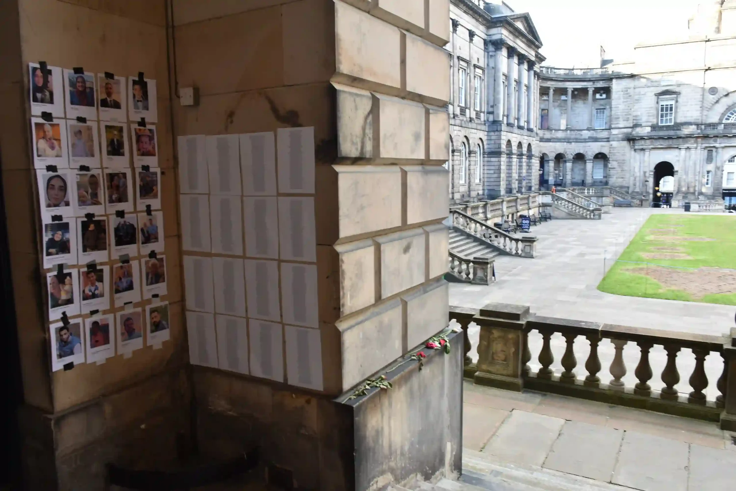 View of the old quad at University of Edinburgh showing lists of names and pictures of people killed in Gaza by Israeli operations