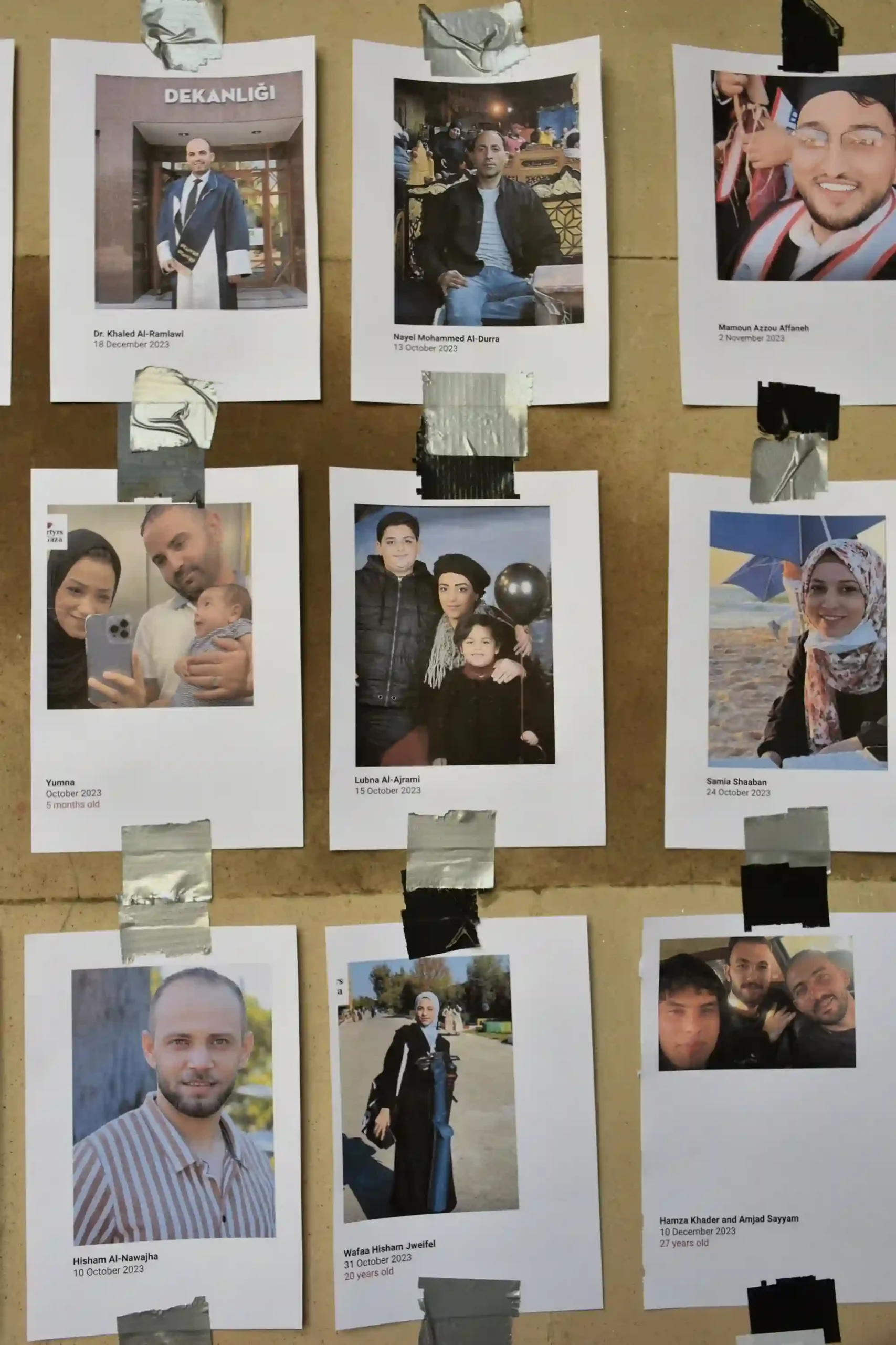 Photographs of people who have been killed in Israeli-Gaza conflict at the University of Edinburgh memorial
