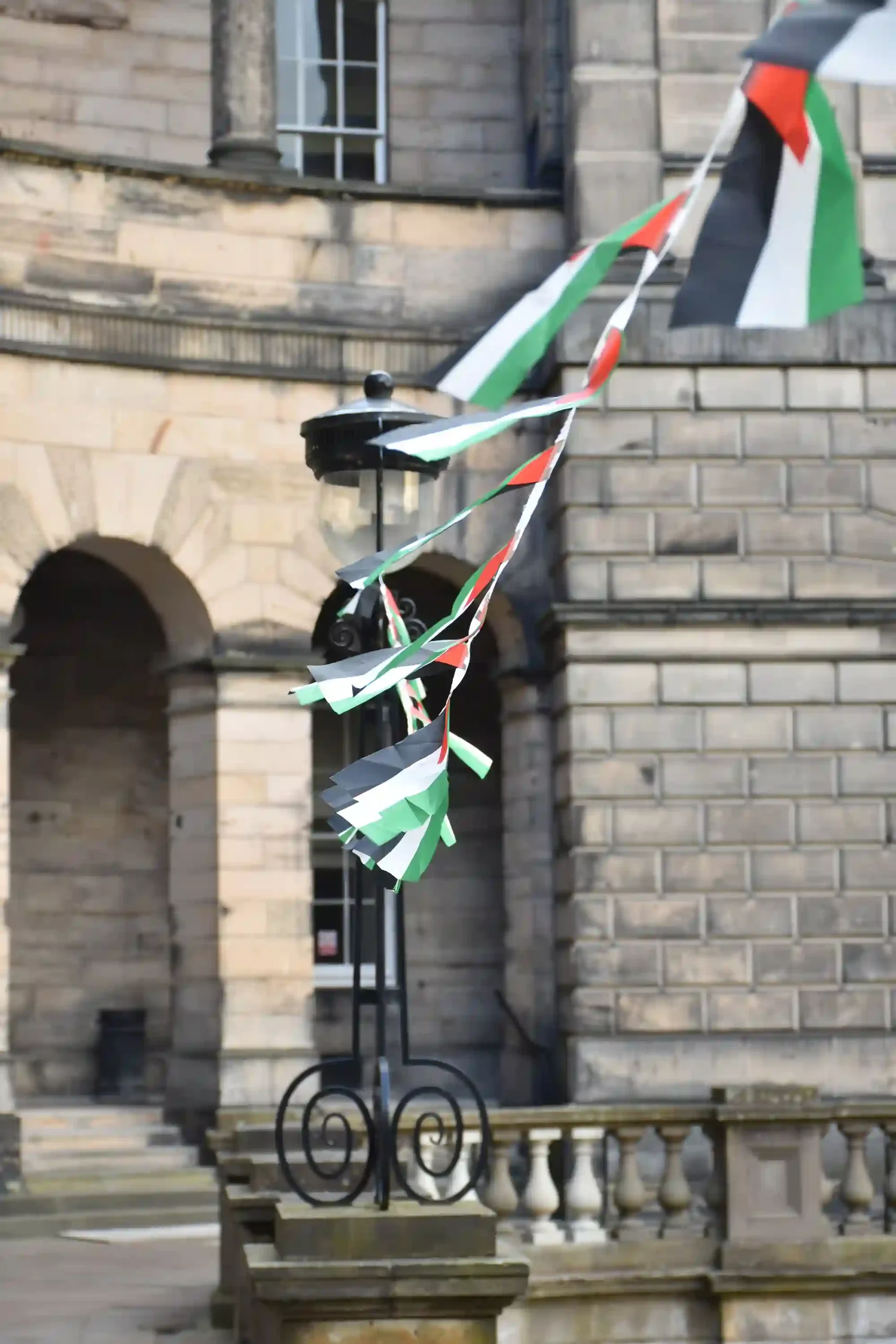 Palestinian flags as part of memorial at the University of Edinburgh raising awareness of civilians killed in Israeli operations